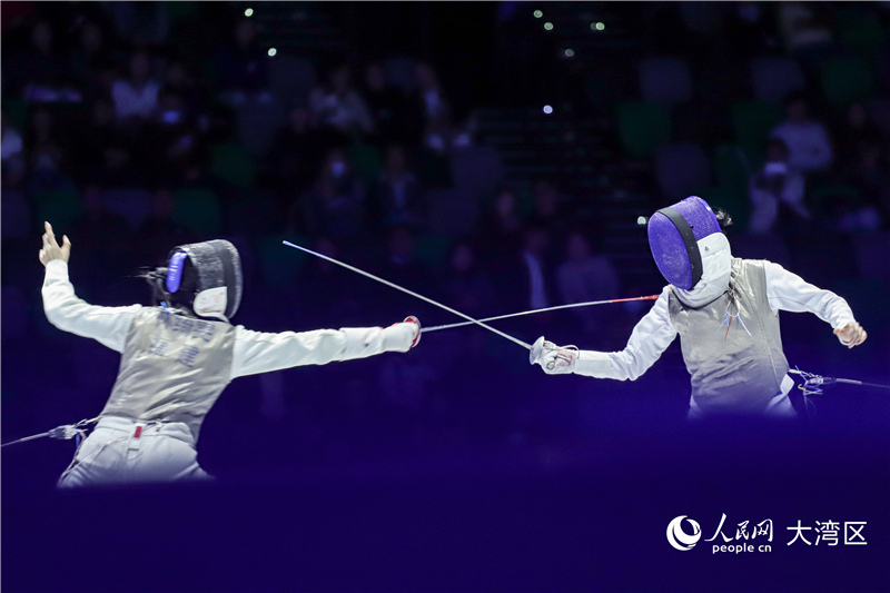 图6.福建队选手林绮雯（左）和重庆队选手王英璎在比赛中。人民网 吴宇扬扬 摄